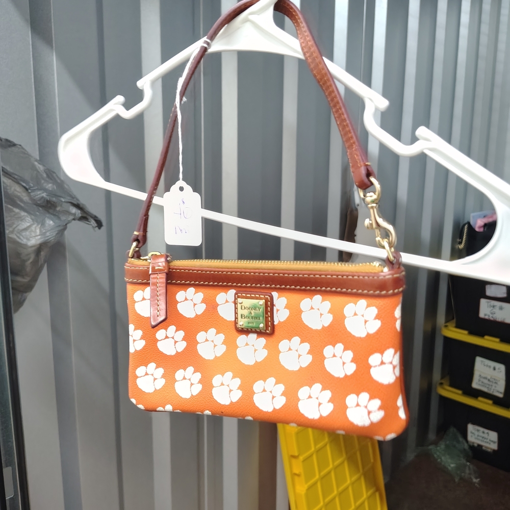 Dooney & Bourke Orange and White Paw Print Wristlet NWOT